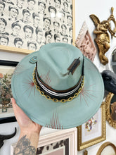 Rustic green rooster outlaw hat with gold