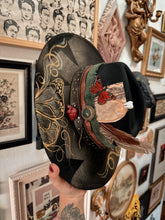 Whimsical butterfly gold hat with trinkets