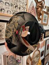 Whimsical butterfly gold hat with trinkets