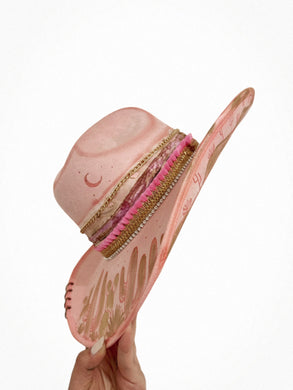 Pink tattooed cowgirl hat with gold and chains