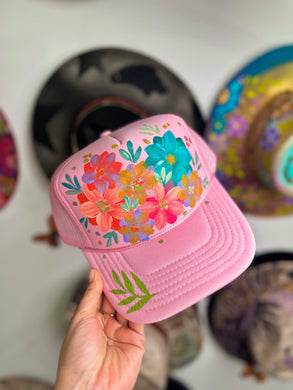 Pink leafy trucker hat
