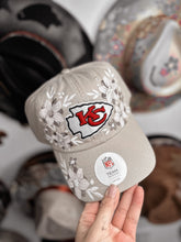 Tan chiefs hat with beige