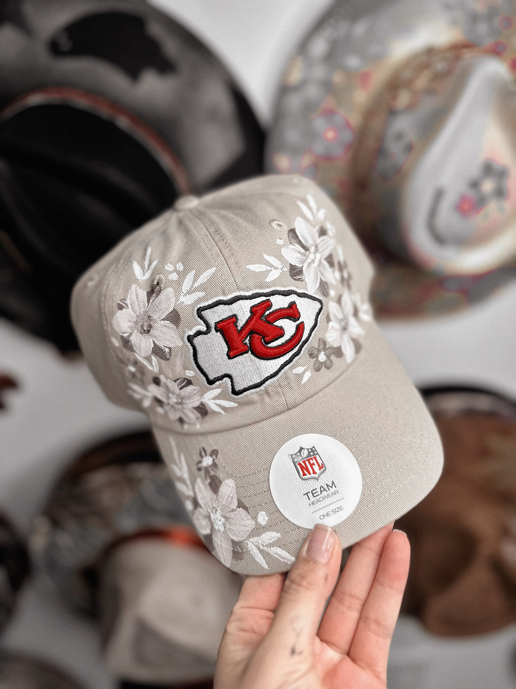 Tan chiefs hat with beige