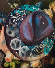 Moons and peacock