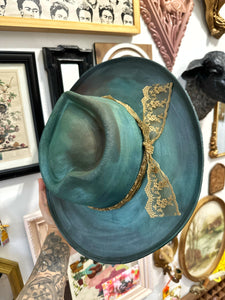 Metallic green heart shape hat