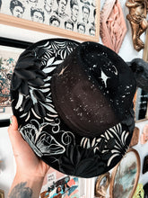 Black and gold peonies with piercings