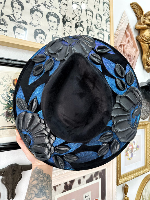 Color shifting hat with black florals: purple and blue