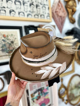 Gigi pip: decorated both sides horse outlaw hat with tans and creams