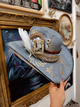 Golden blue cowgirl