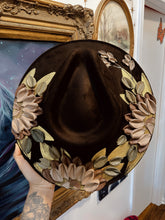 Brown and tan florals hat