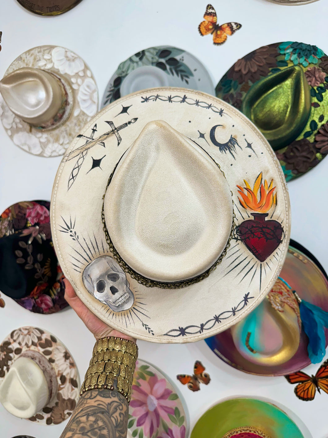Tattooed painted hat with chain