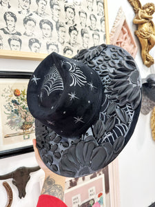 Black hat with black metallic and black florals