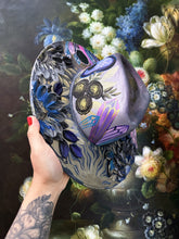 Silver colored shifting witchy hat