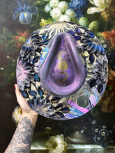 Silver colored shifting witchy hat