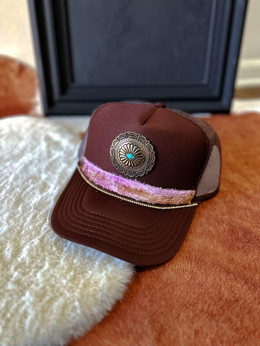 One of one: brown concho trucker hat