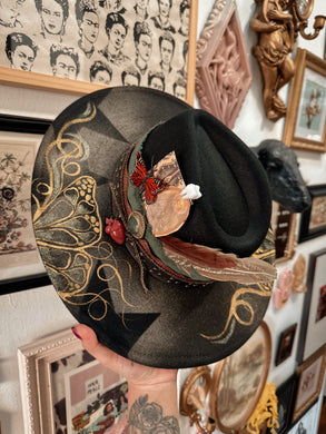 Whimsical butterfly gold hat with trinkets