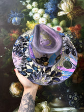Silver colored shifting witchy hat