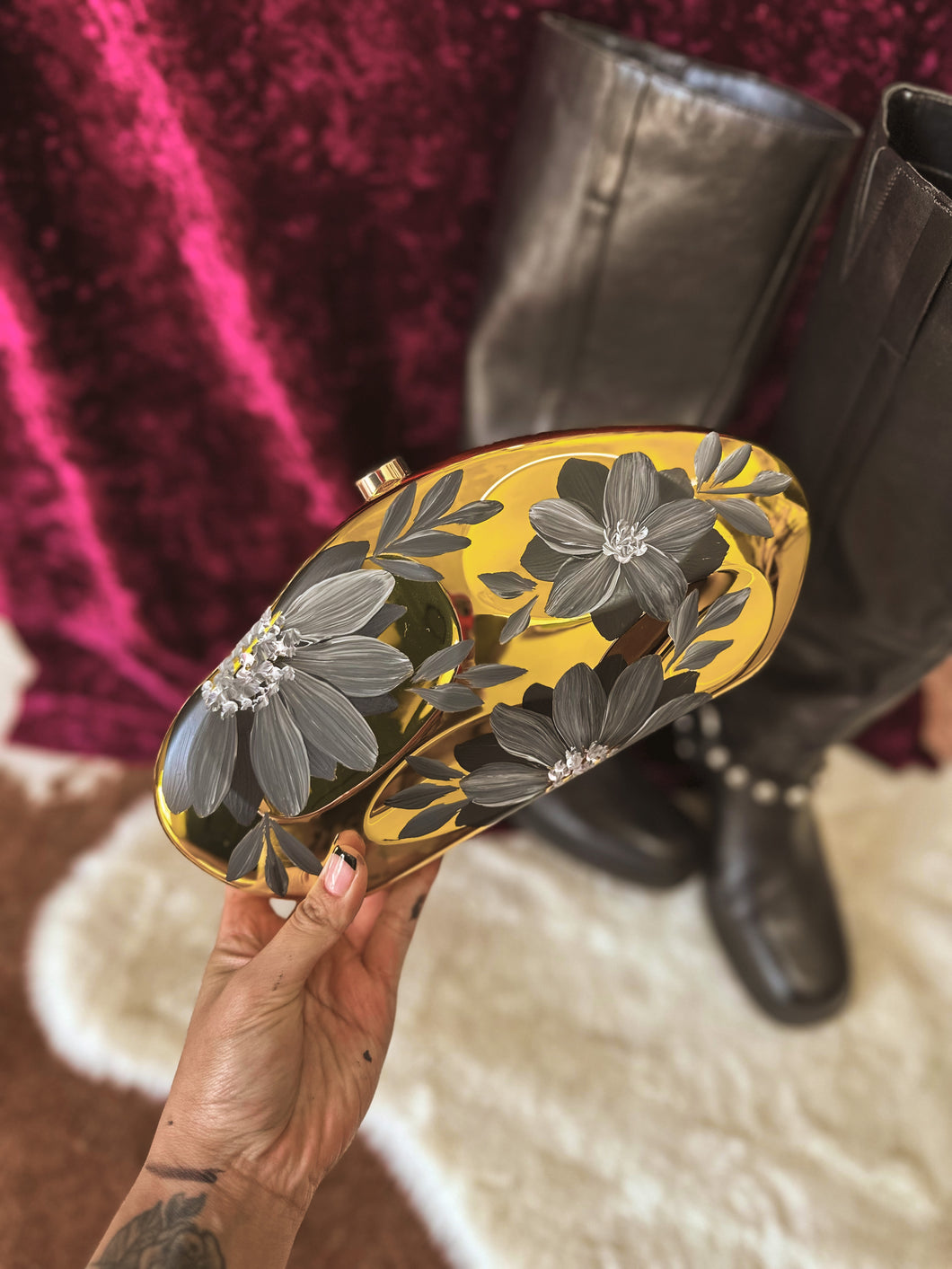 Stadium, friendly gold Crossbody handbag with black florals ￼