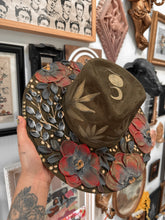 Olive green gold and red with black hat