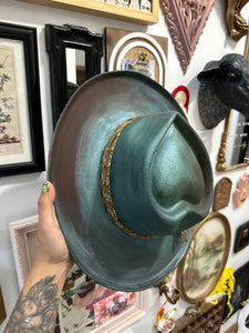 Metallic green heart shape hat