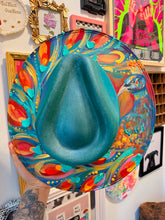 Extra colorful with turquoise shimmer peacock hat