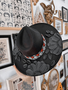 Black on black with pretty fancy band