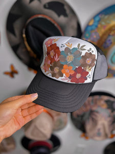 Earthy muted tones trucker hat