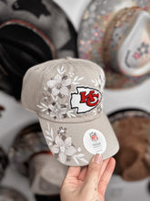 Tan chiefs hat with beige