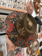 Olive green gold and red with black hat