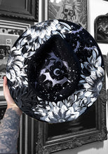 Silver black and white bats and stars