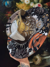 Retro gold and silver spooky hat