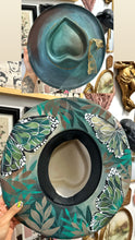 Metallic green heart shape hat