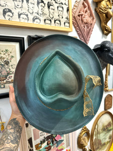 Metallic green heart shape hat