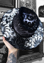 Silver black and white bats and stars