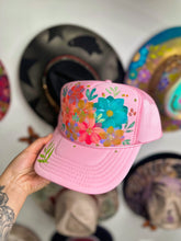 Pink leafy trucker hat