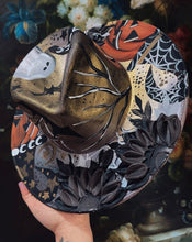 Retro gold and silver spooky hat