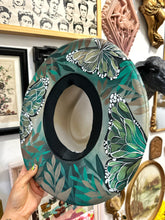 Metallic green heart shape hat