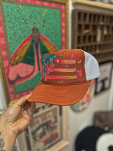 Brunt orange pink and turquoise American flag