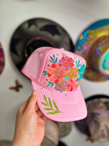 Pink leafy trucker hat