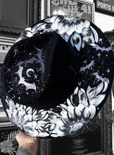 Silver black and white bats and stars