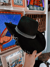 OUTCAST ANTHEM: Cowgirl piercings and chains