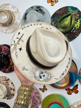 Tattooed painted hat with chain