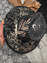 Black and gold peonies with piercings
