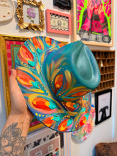 Extra colorful with turquoise shimmer peacock hat