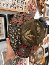 Olive green gold and red with black hat