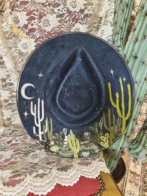 Navy blue hat with green and pearls