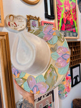 Muted pastels with gold orchids