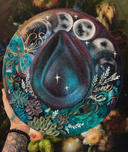 Moons and peacock