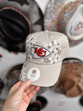 Tan chiefs hat with beige