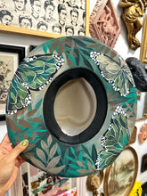 Metallic green heart shape hat